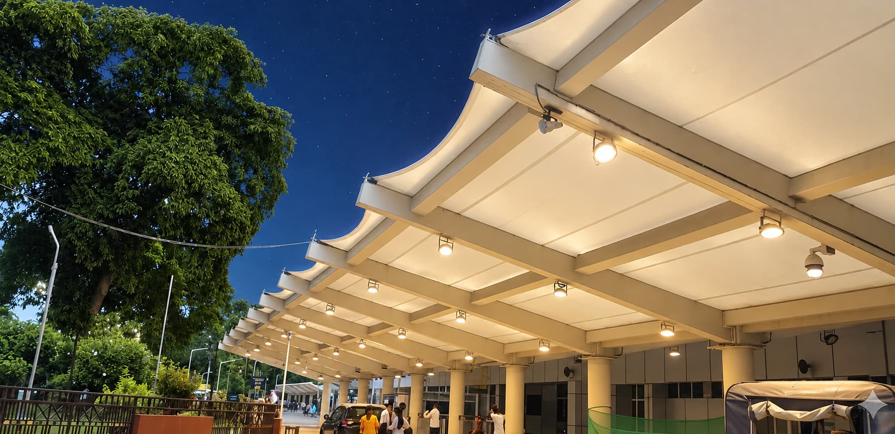 Underside view along the covered walkway canopy at Silchar Airport